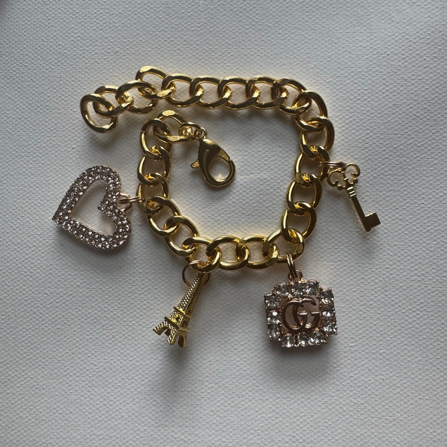 Gold (solid) Gg charm bracelet