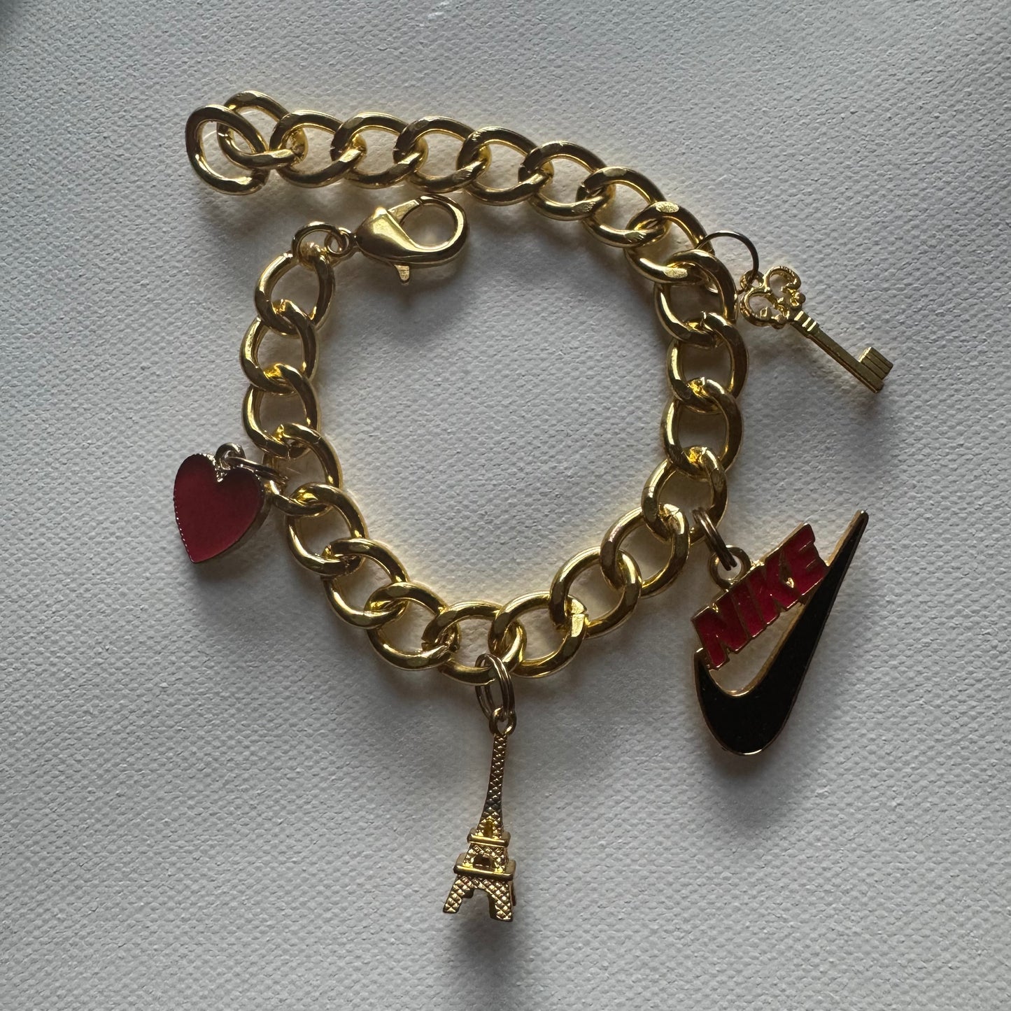 Gold N charm bracelet