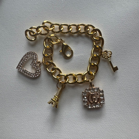 Gold (solid) Gg charm bracelet